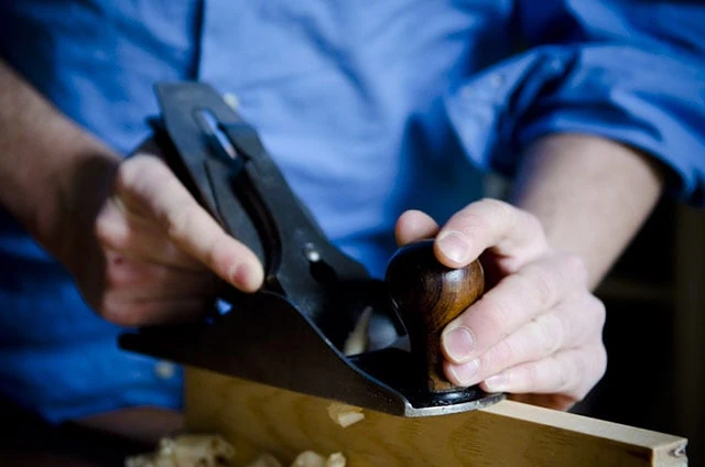Stanley #4 Smoothing Hand Planer Or Hand Plane Being Used On A Board's Edge