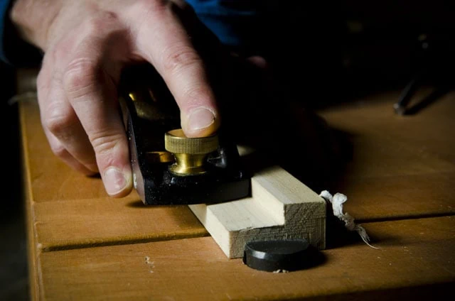 Lie-Nielsen Low Angle Rabbet Block Plane Trimming A Rabbet Joint On A Woodworking Workbench