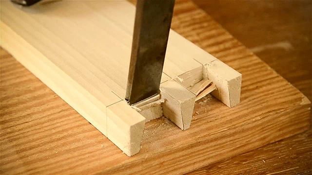 Cutting A Dovetail Joint With A Woodworking Chisel