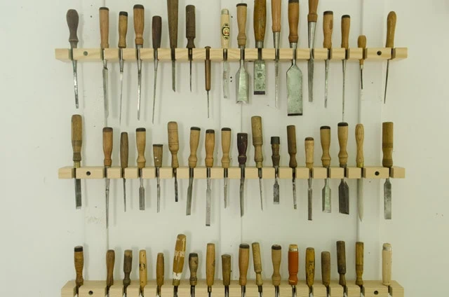 A Whole Wall Of Antique Chisels On A Rack In The Wood And Shop Traditional Woodworking School