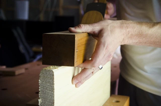 Joshua Farnsworth Using An 18Th Century Reproduction Jointer Plane To Joint The Edge Of A Board In A Workbench Vise