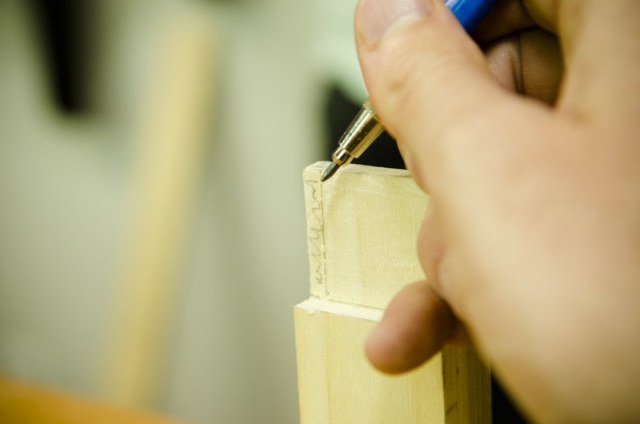 Using A Pencil For Layout Lines For Cutting Tenons Haunches On A Mortise And Tenon Joint