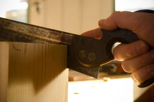 Testing The Cut Of A Newly Sharpened Antique Dovetail Saw On A Pine Board