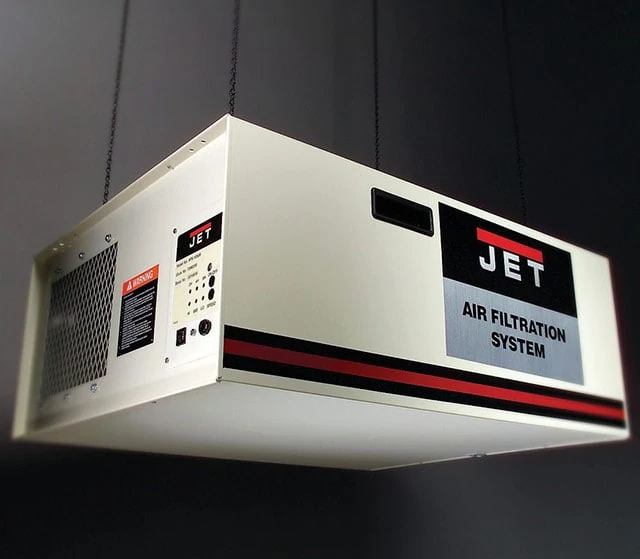 Jet Air Filtration System Hanging From A Ceiling
