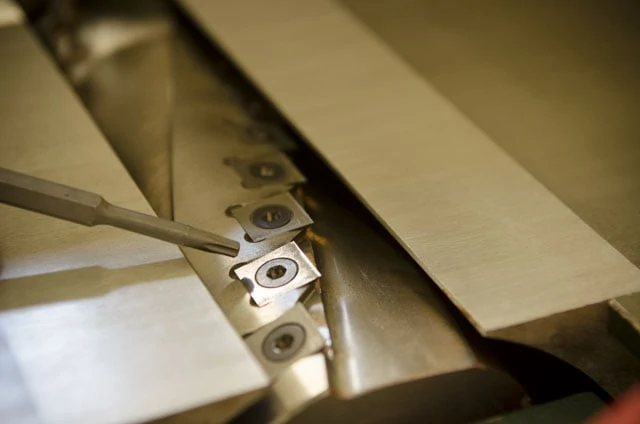Tightening Carbide Blade On Jointer Spiral Cutterhead