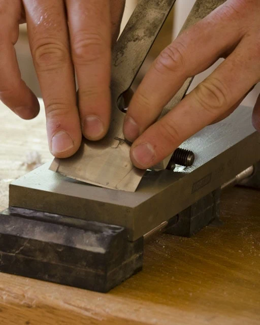 Sharpening A Cambered Handplane Iron On A Water Stone With A Honing Guide