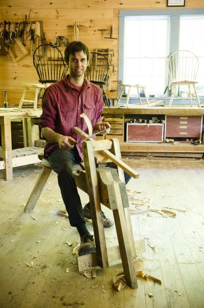 Elia Bizzarri Sitting At His Shaving Horse Making A Windsor Chair In His North Carolina Workshop