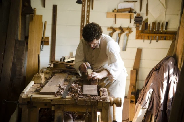 Brian Weldy Hand Planing On A Woodworking Bench Workbench In The Hay Cabinet Making Shop In Colonial Williamsburg