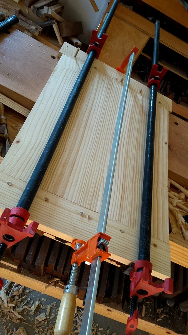Wood Clamps On A Breadboard End Table Top