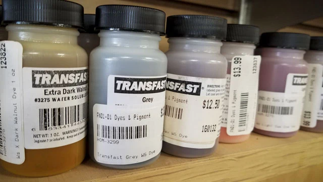 Bottles Of Transfast Homestead Dye Powder On Shelf
